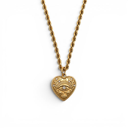 Gold heart pendant with a crystal-set eye at its centre on a rope chain